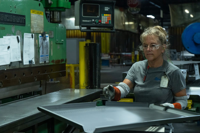 Lozier employee working in the plant