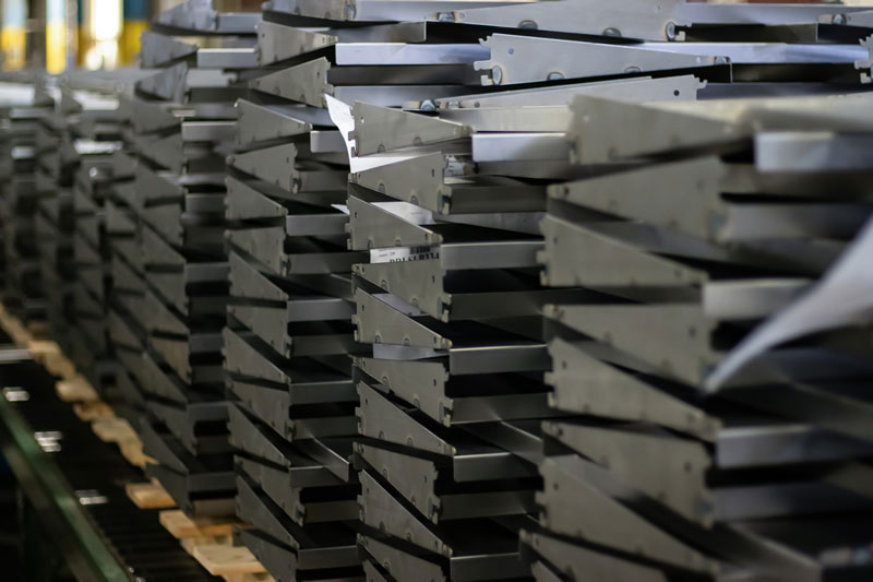 Shelves stacked on a conveyor in the Lozier plant