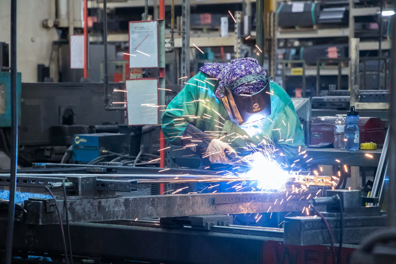 Welder in the Lozier plant welding