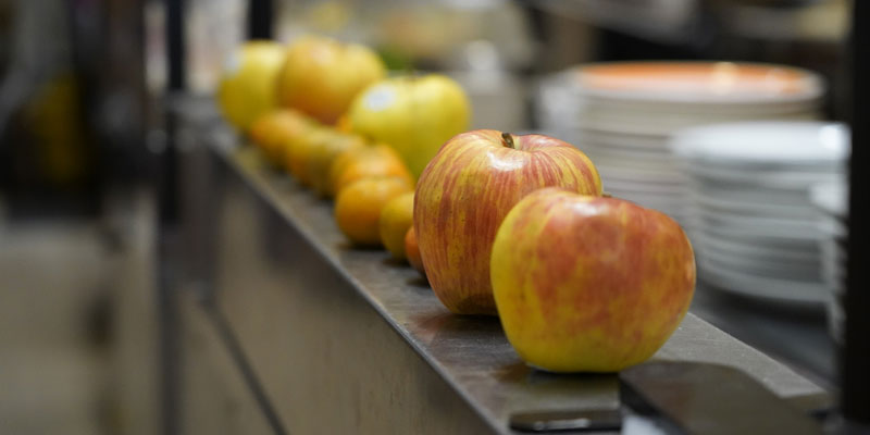 Apples on a ledge
