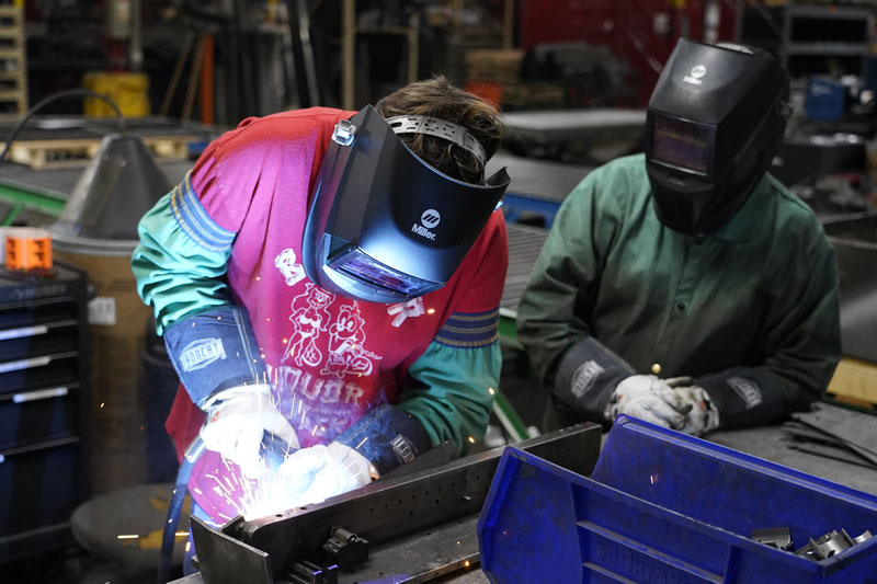 Lozier training a student during a job shadow