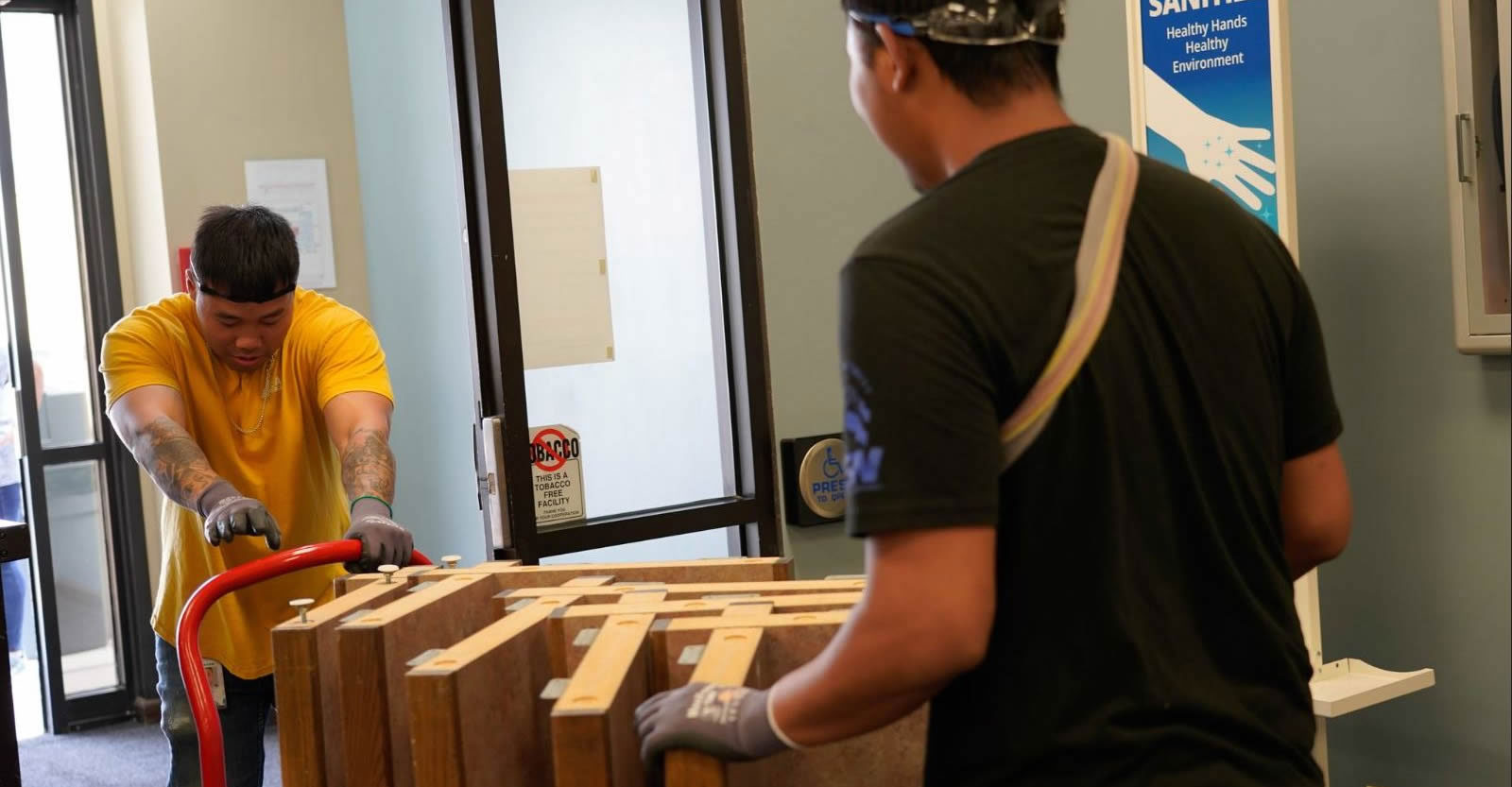 Karen Society of Nebraska receives donation of Lozier office furniture for new resource office