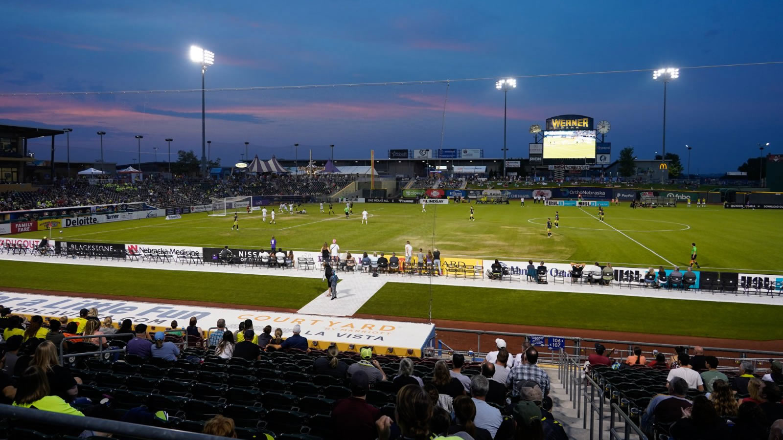 Lozier employees celebrate at Union Omaha soccer game